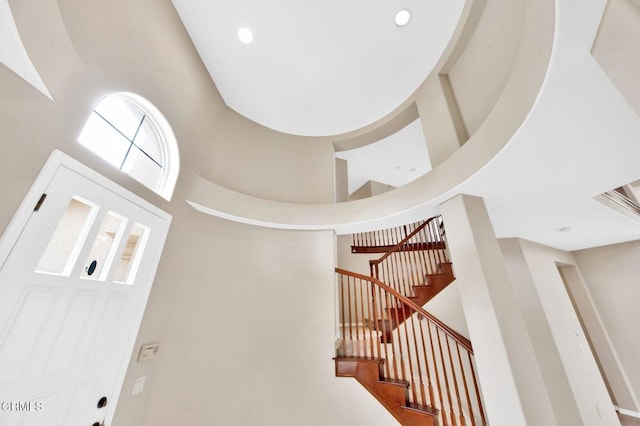 stairs with a towering ceiling