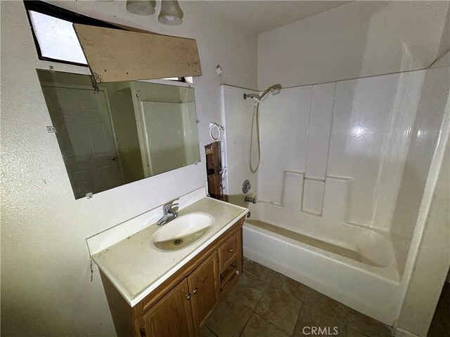 bathroom featuring shower / bath combination, tile patterned flooring, and vanity