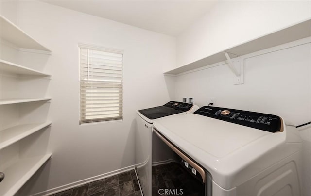 laundry area with separate washer and dryer