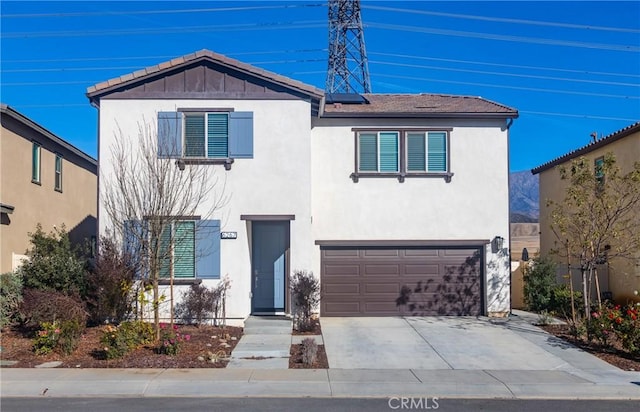 front of property featuring a garage and solar panels