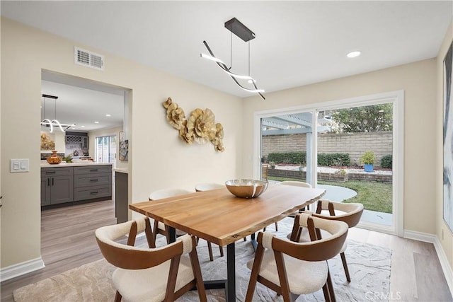 dining area featuring light hardwood / wood-style flooring