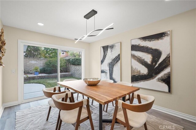 dining area featuring hardwood / wood-style floors