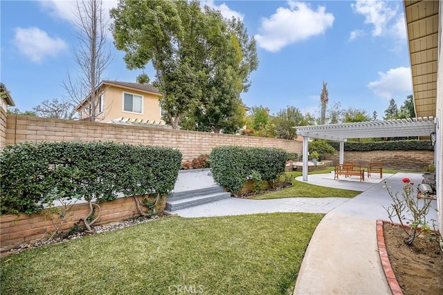 view of yard with a patio area and a pergola