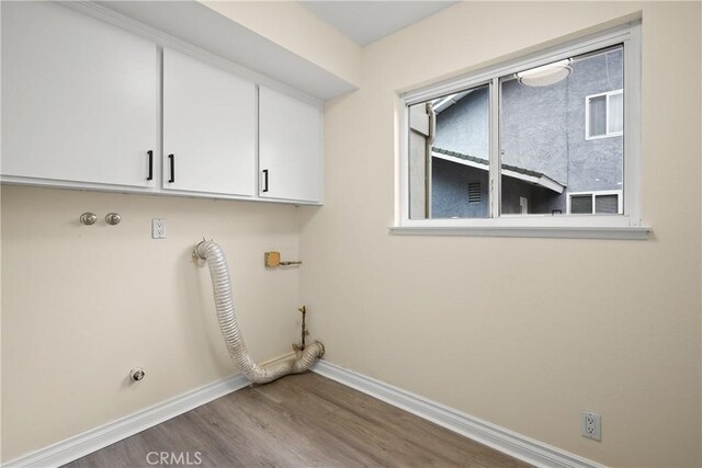 washroom featuring cabinets and hardwood / wood-style floors