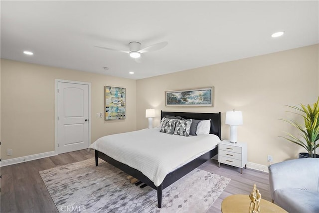 bedroom featuring ceiling fan and wood-type flooring