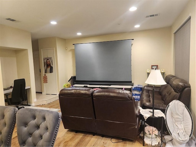 home theater featuring light hardwood / wood-style flooring