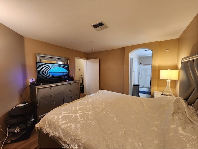 bedroom featuring dark wood-type flooring