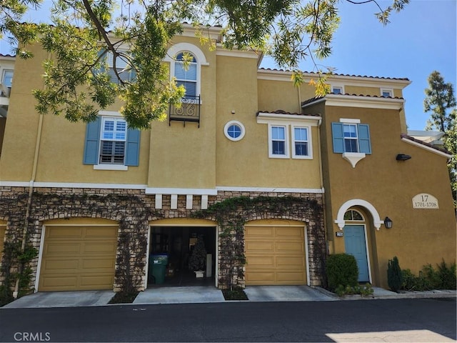 view of front of home with a garage