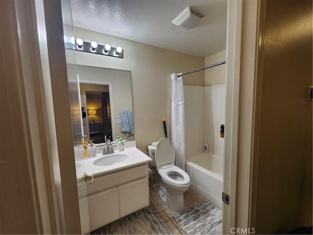 full bathroom with vanity, toilet, shower / tub combo, and a textured ceiling