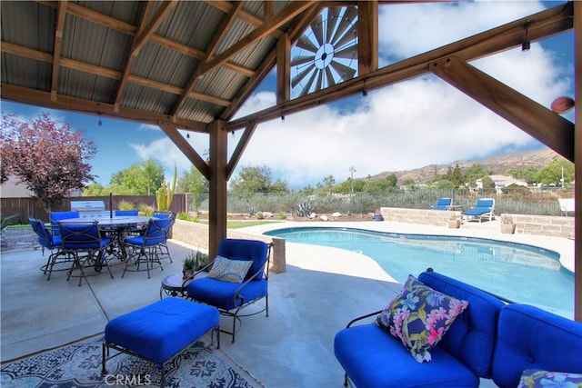 view of pool featuring a mountain view, a gazebo, and a patio