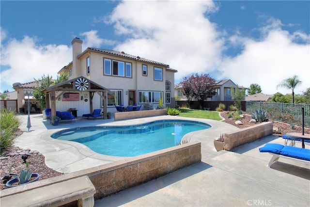 view of pool featuring a gazebo, an outdoor hangout area, and a patio