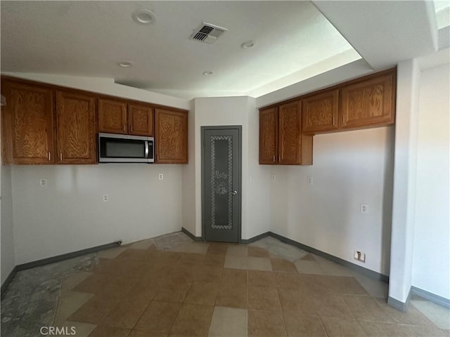 kitchen featuring light tile patterned flooring