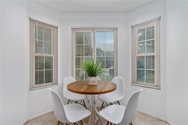 dining room with light tile patterned floors