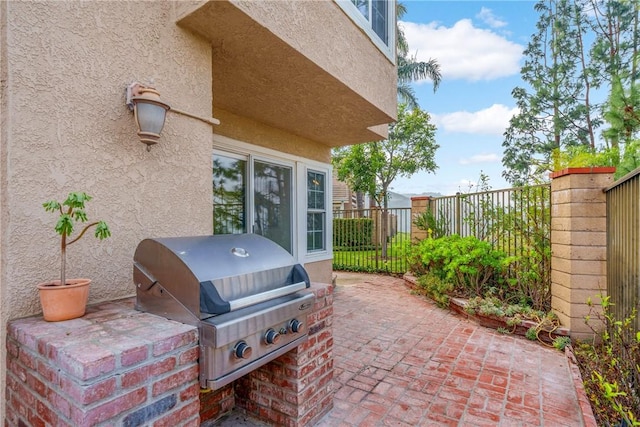 view of patio with a grill