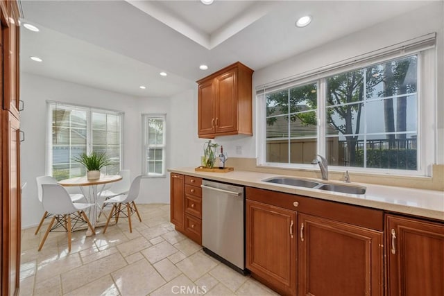 kitchen with sink, dishwasher, and a healthy amount of sunlight