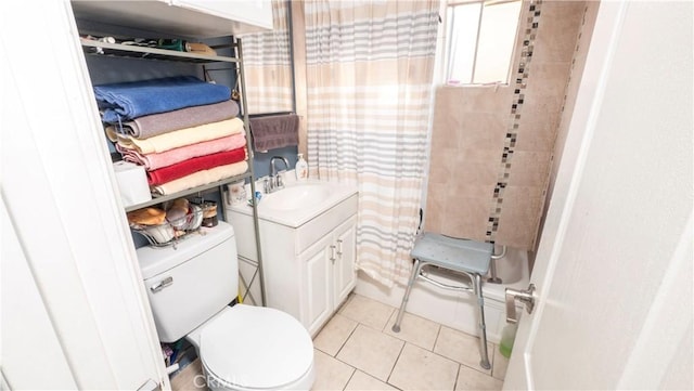 bathroom featuring toilet, vanity, tile patterned flooring, and a shower with shower curtain