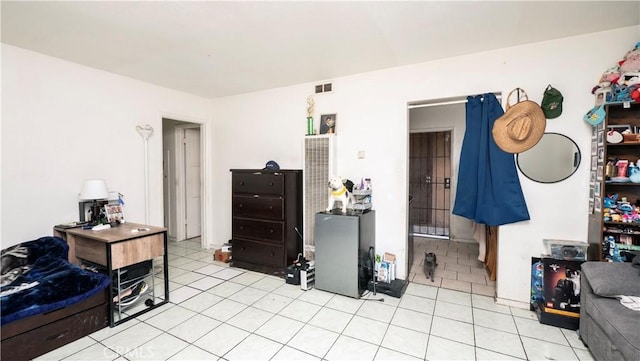 interior space with light tile patterned floors