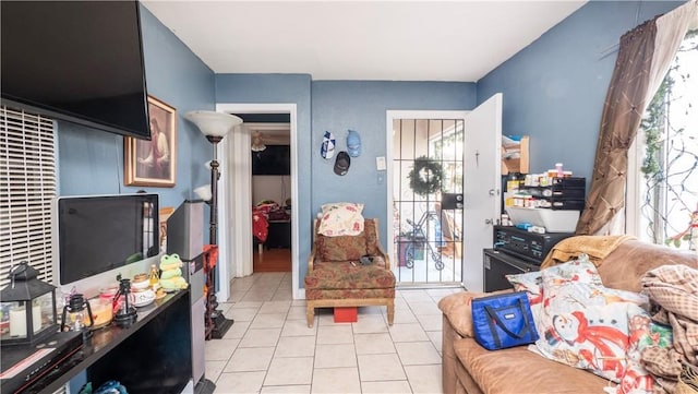 living room featuring light tile patterned floors and plenty of natural light