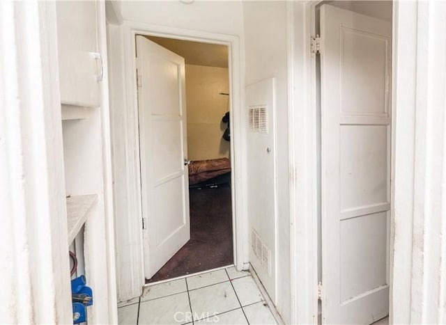 bathroom featuring tile patterned flooring