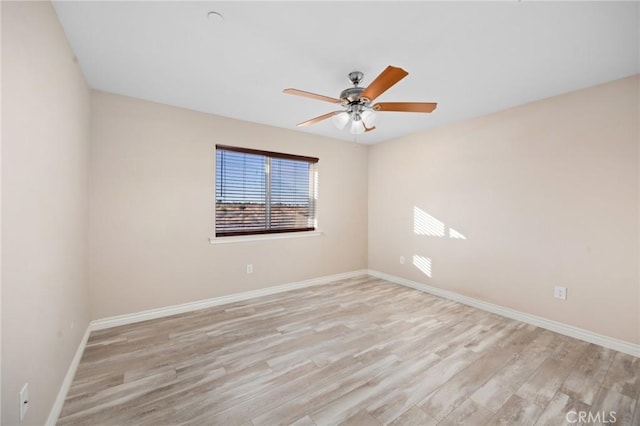 unfurnished room with ceiling fan and light hardwood / wood-style floors