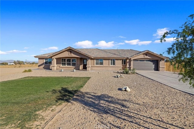 ranch-style house with a front lawn and a garage