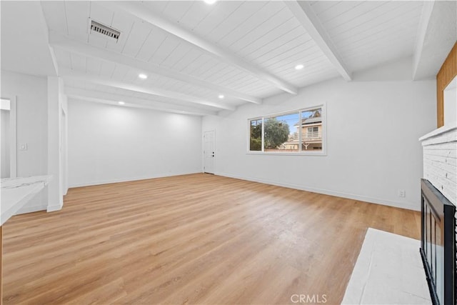 unfurnished living room with a brick fireplace, light hardwood / wood-style flooring, vaulted ceiling with beams, and wooden ceiling