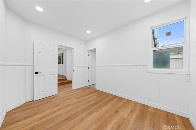 unfurnished bedroom featuring light hardwood / wood-style floors