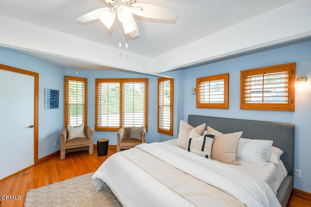 bedroom featuring ceiling fan and hardwood / wood-style floors