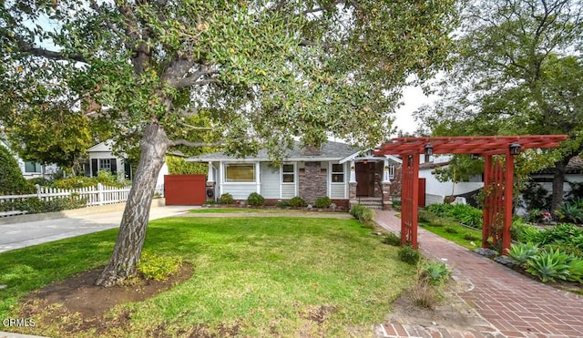 view of front of house featuring a front lawn and a pergola