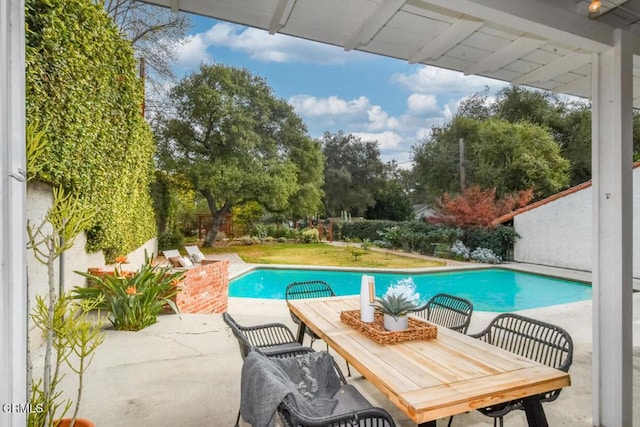 view of pool with a patio