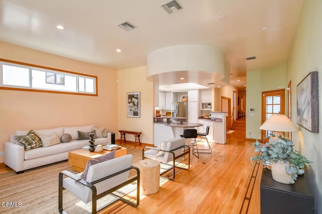 living room featuring light wood-type flooring