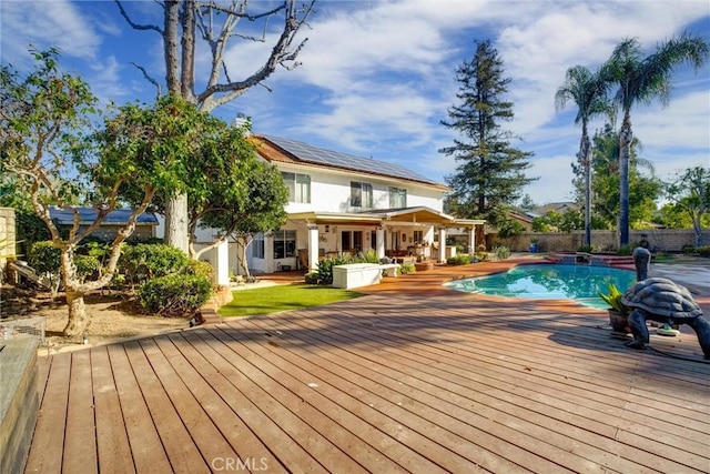 view of pool featuring a wooden deck