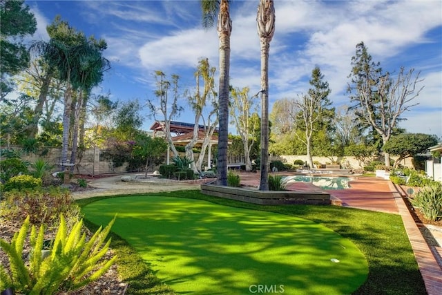 view of property's community featuring a swimming pool