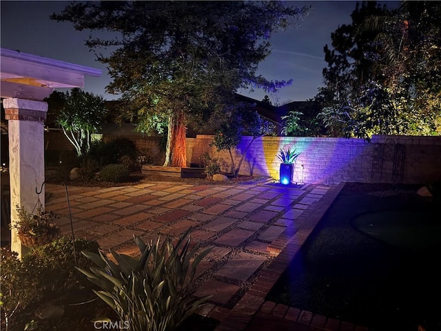 view of patio at twilight