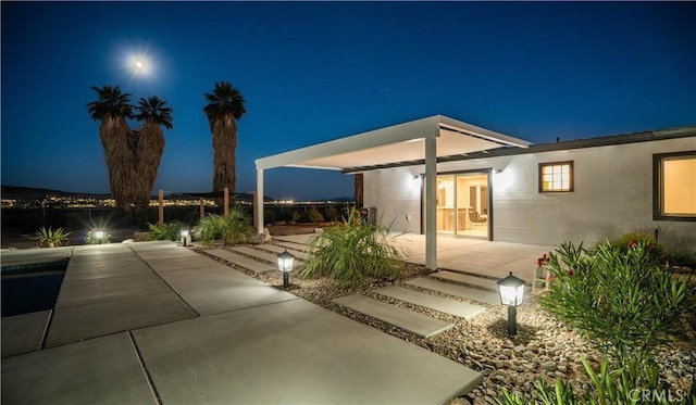 view of patio at night