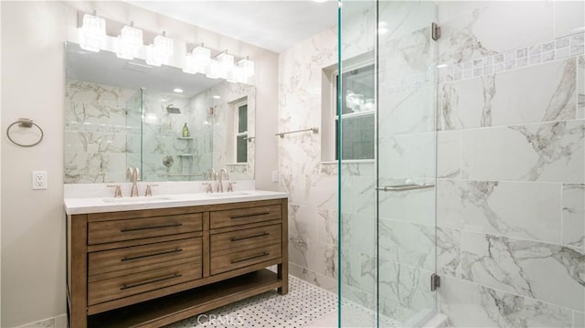 bathroom featuring walk in shower and vanity