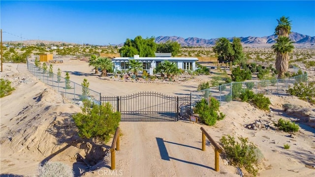 surrounding community featuring a mountain view