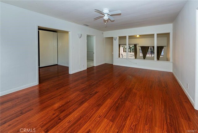 7716 Owensmouth Ave, Canoga Park, CA 91304 - spare room with ceiling fan, wood finished floors, and baseboards
