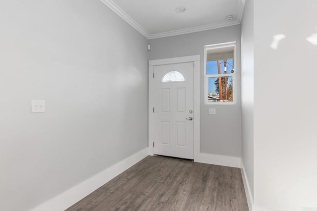 entrance foyer with dark wood-style flooring, baseboards, and ornamental molding