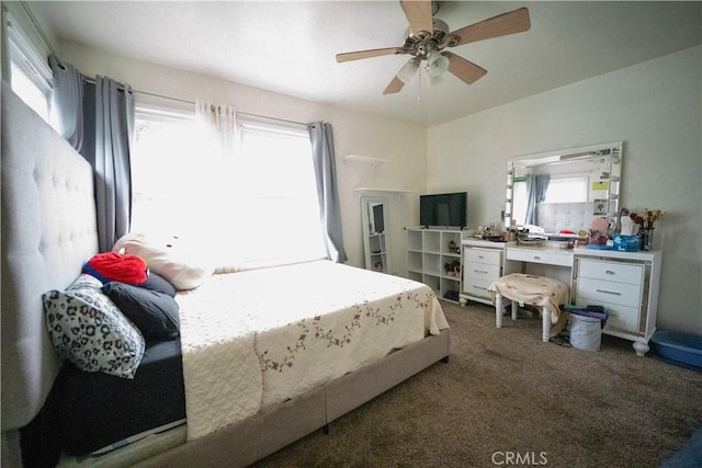 carpeted bedroom featuring a ceiling fan
