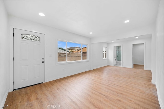 entrance foyer with light hardwood / wood-style flooring