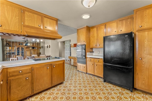 kitchen featuring black appliances