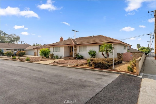 single story home featuring a garage