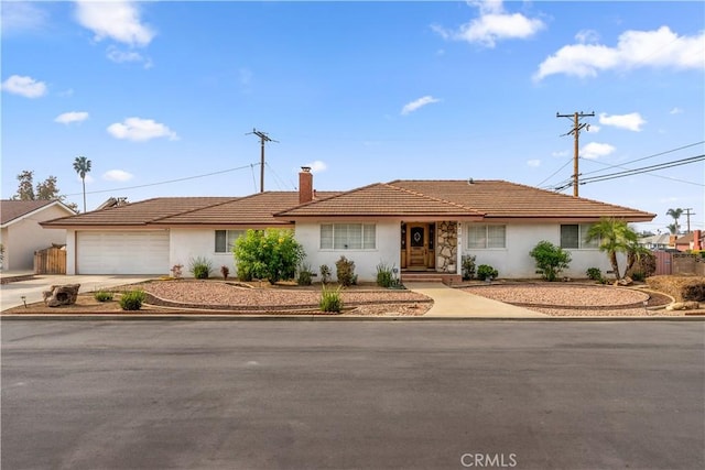 ranch-style house with a garage