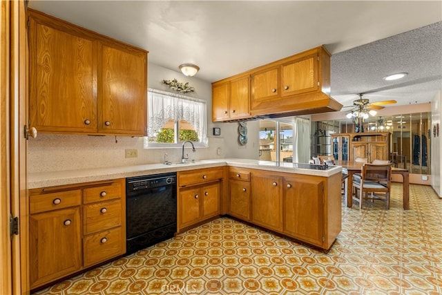 kitchen with kitchen peninsula, ceiling fan, stainless steel gas cooktop, dishwasher, and sink