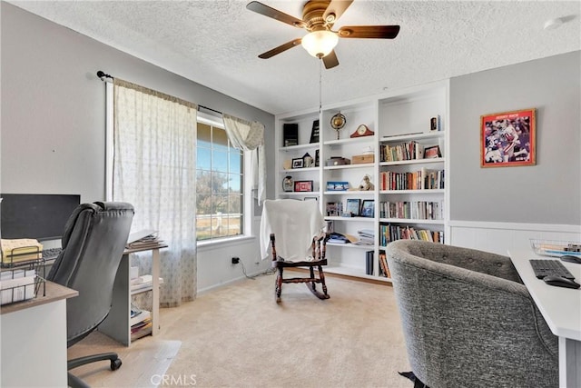 10187 Mesquite St, Oak Hills, CA 92344 - carpeted office space featuring a textured ceiling and ceiling fan