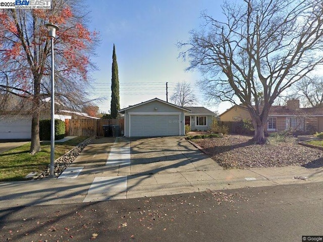 single story home featuring a garage