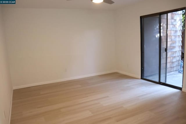 unfurnished room featuring light hardwood / wood-style floors and ceiling fan