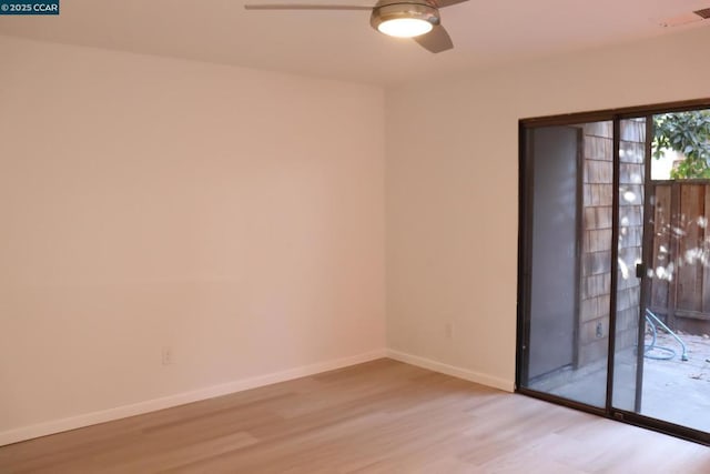 unfurnished room featuring light wood-type flooring and ceiling fan