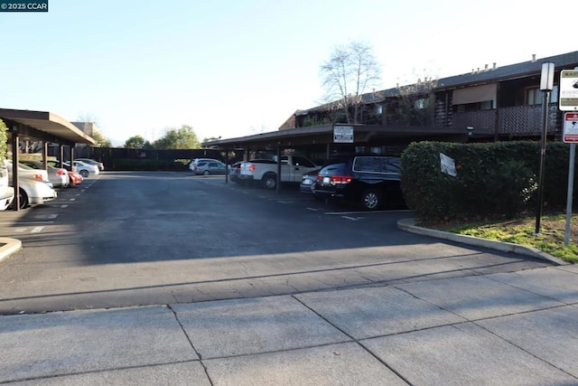 view of car parking with a carport